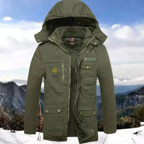 Green winter jacket with mountainous background