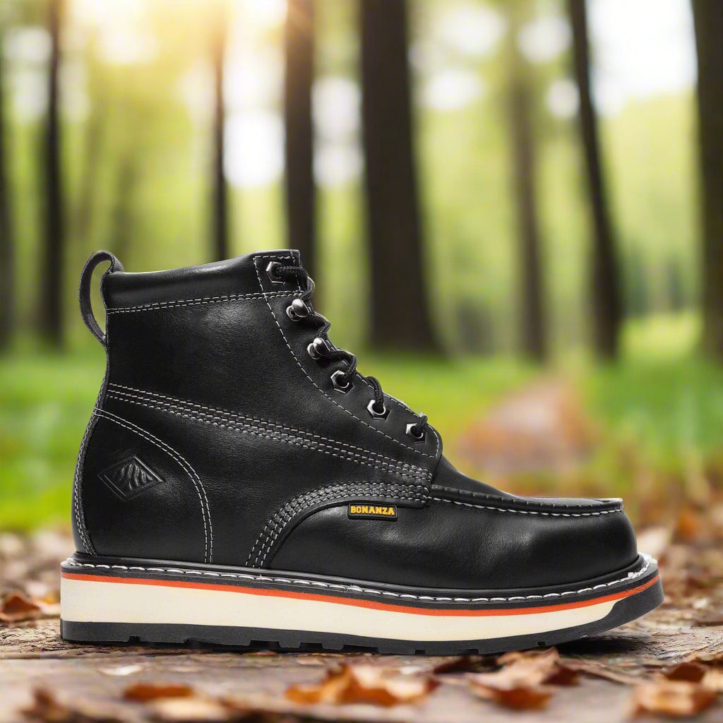 Black leather boot with a white sole on a light gray background, featuring the brand name 'Ironclad'.