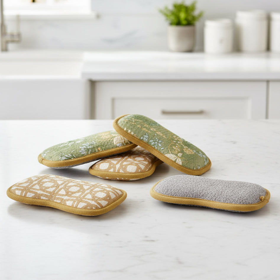 Set of patterned pads with a textured gray pad on a white background