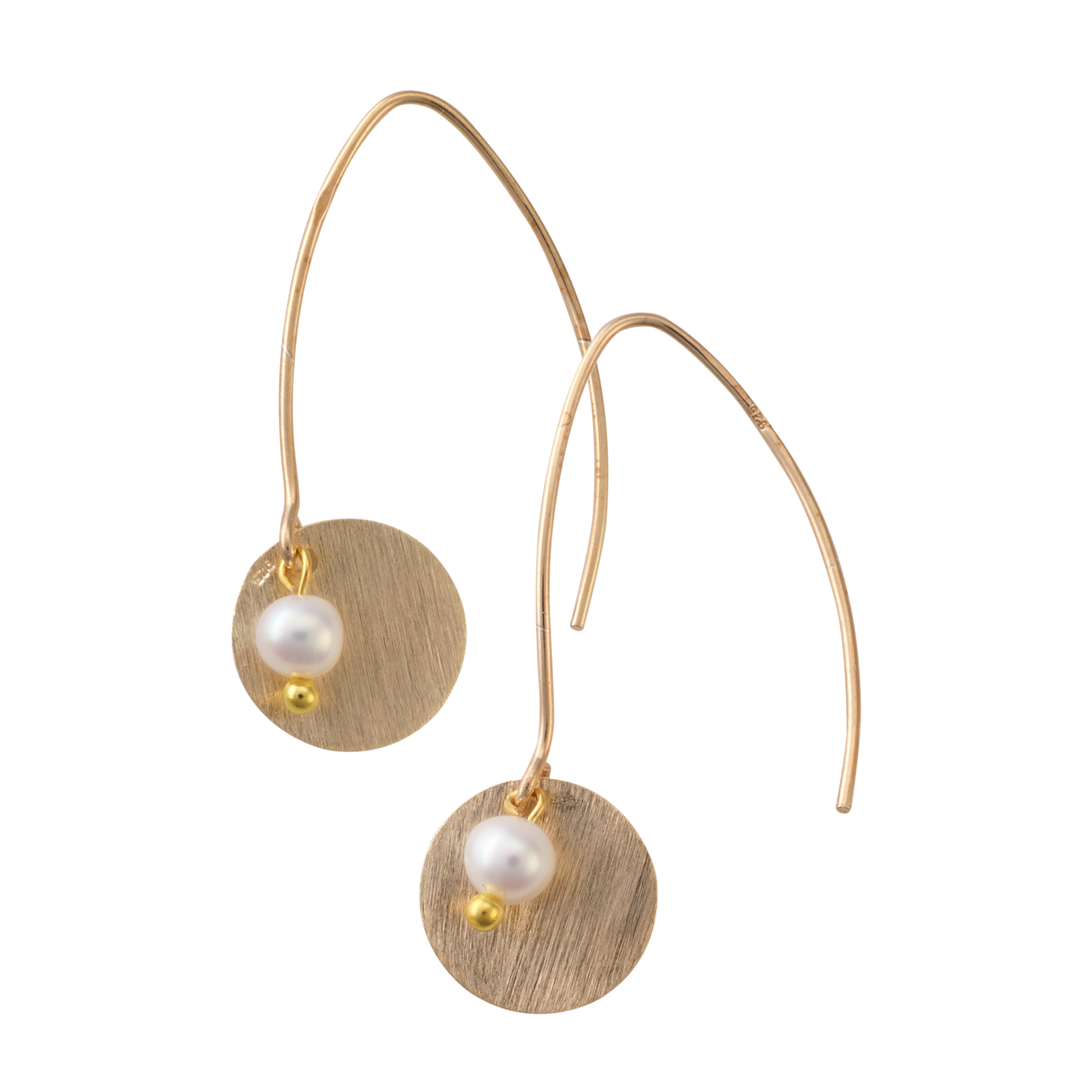 Gold earrings with pearl drops on a white background