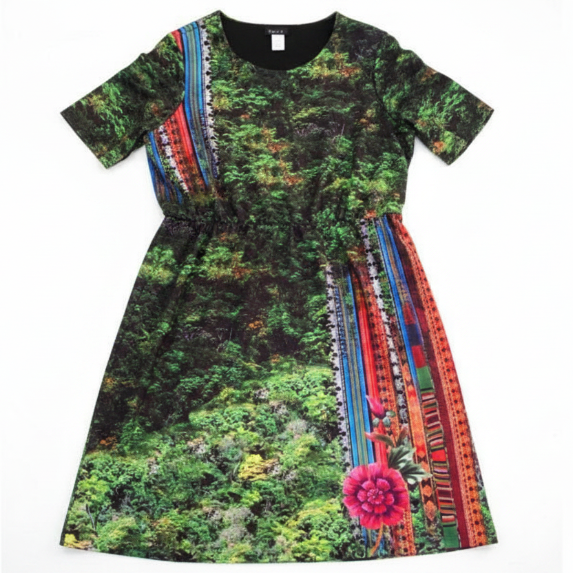 Dress with a forest pattern and colorful accents on a white background