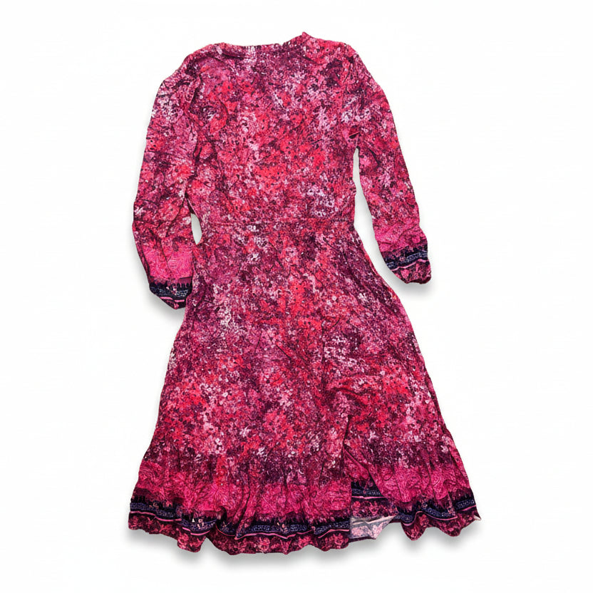 Pink floral dress on a white background