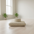 Beige meditation with a round cushion on a white background