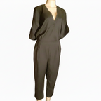 Brown jumpsuit on a mannequin against a white background