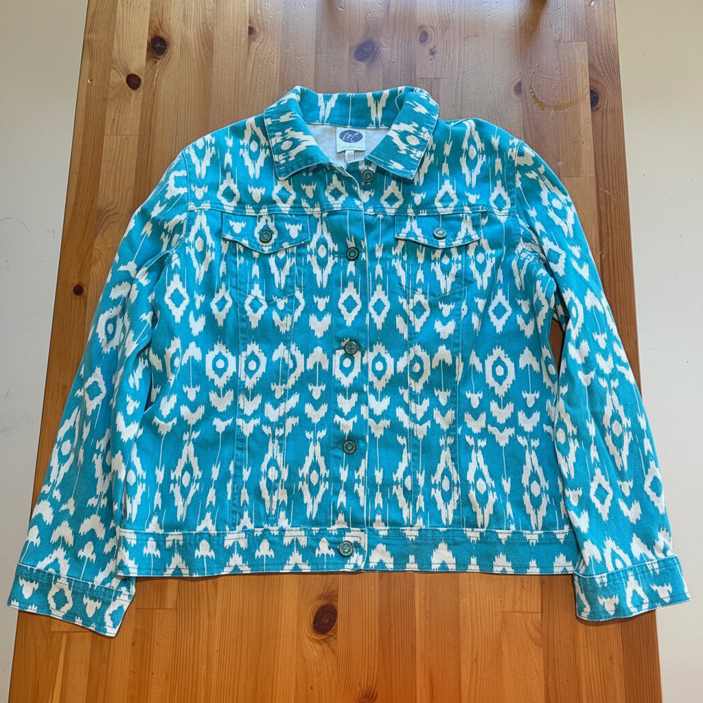 Blue and white patterned jacket on a wooden table
