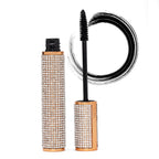 Mascara with rhinestone-covered casing on a white background
