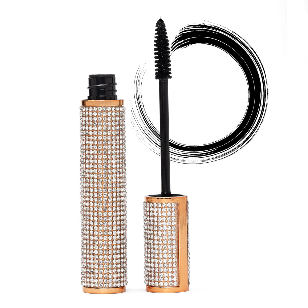 Mascara with rhinestone-covered casing on a white background