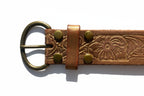Brown leather belt with brass buckle