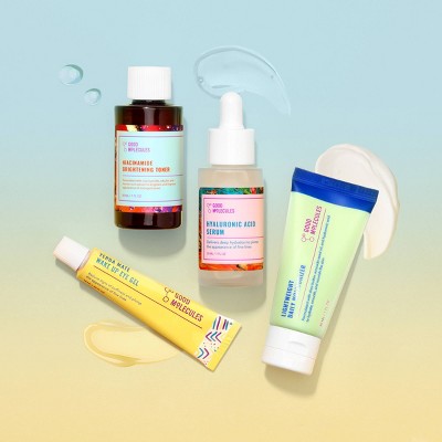 Collection of skincare products on a gradient background
