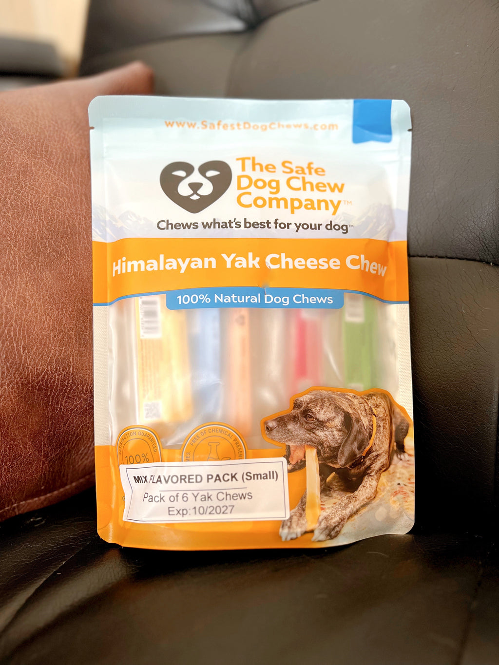 Package of Himalayan Yak Cheese Chews for dogs by The Safe Dog Chew Company on a couch.