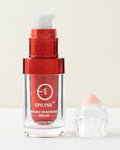Red skincare serum bottle with applicator on a white background