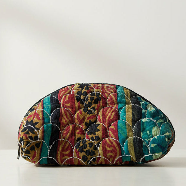 Colorful patterned fabric pouch on a white background