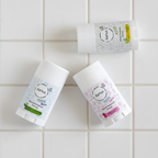 Three deodorant sticks from the brand 'Benat' on a white background