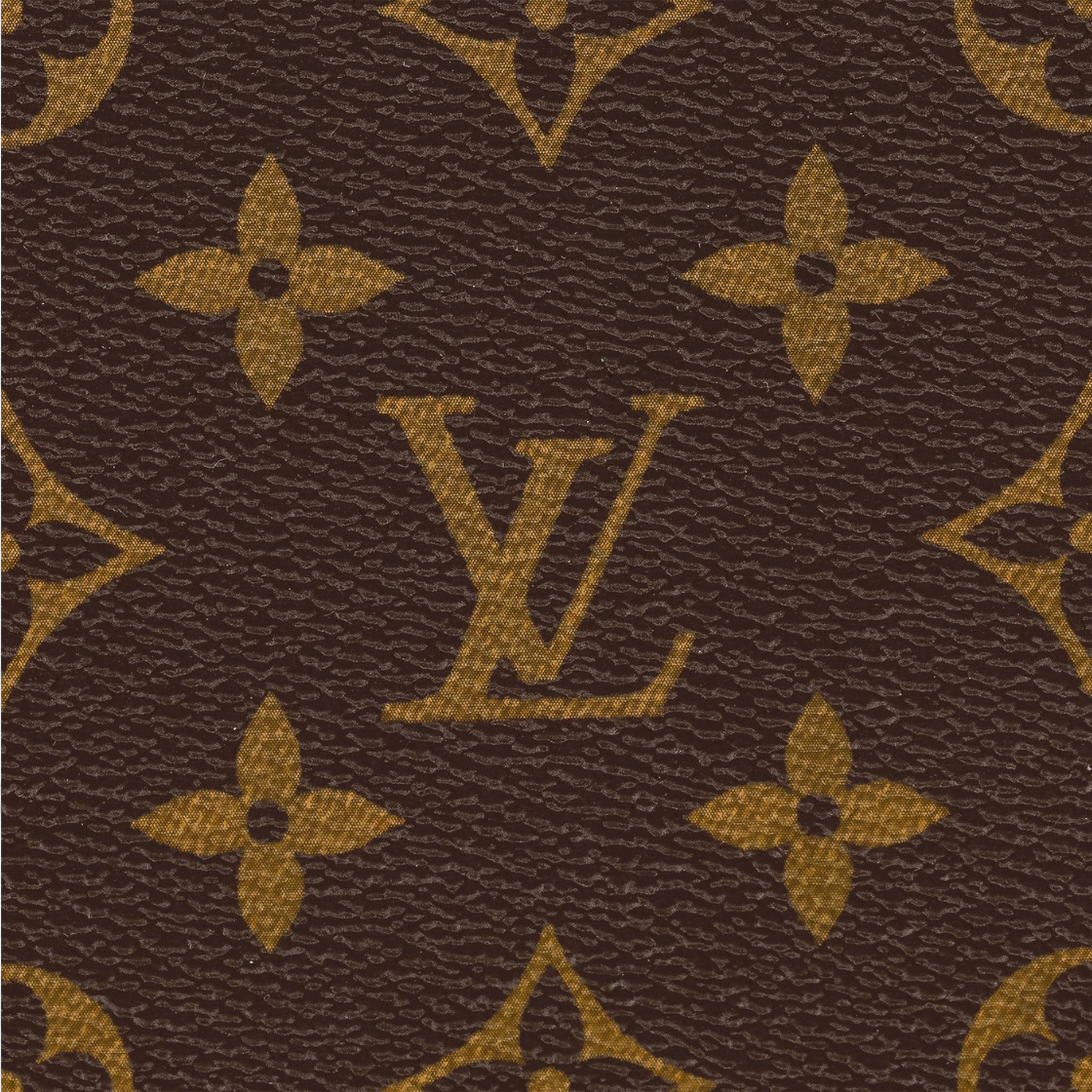 Close-up of Louis Vuitton monogram pattern on brown leather
