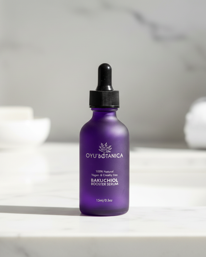 Purple bottle with dropper labeled 'Oyu Botanica' on a white surface with a blurred background