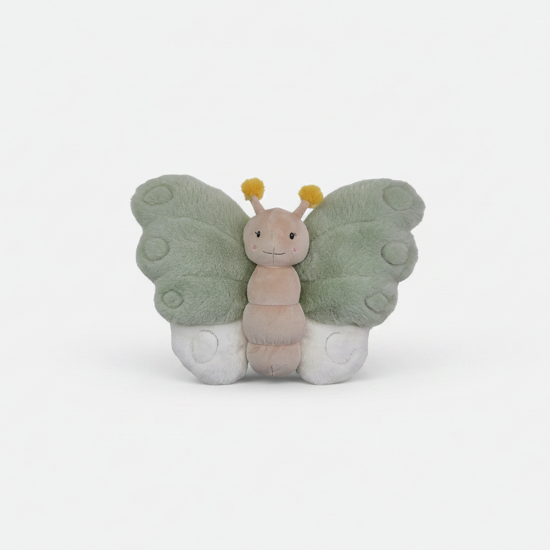 Butterfly-shaped plush toy on a white floor