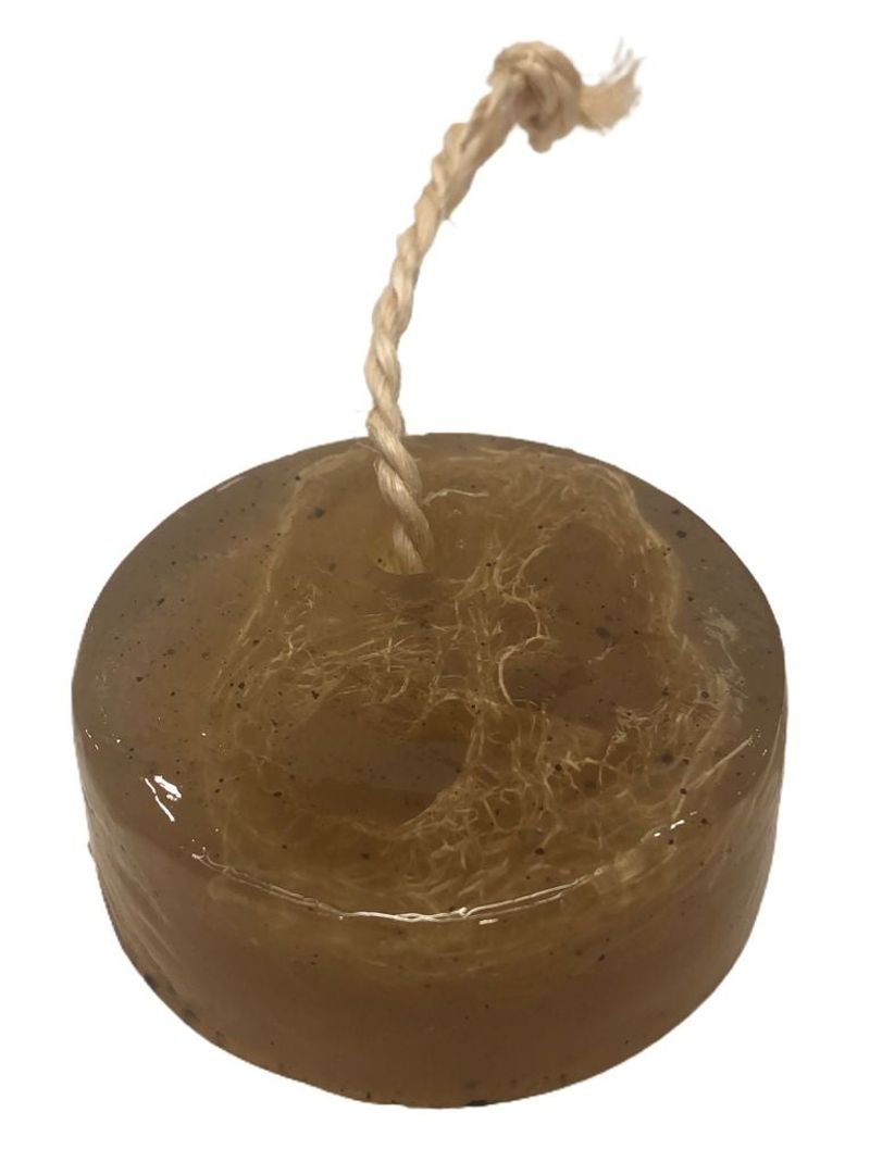 Brown candle with a rope on a white background