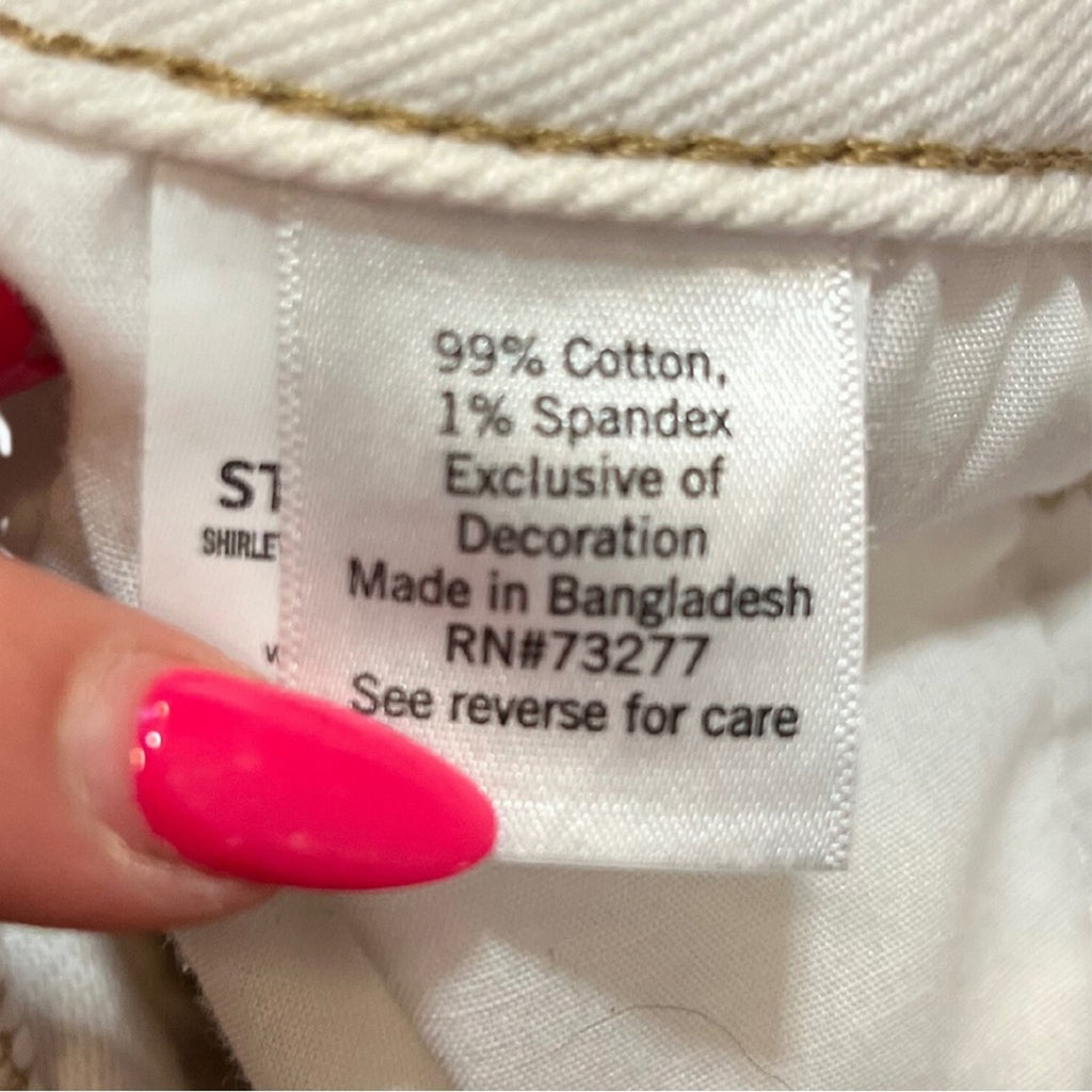 Clothing label with text on a white fabric background