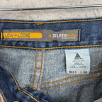 The DESTROYED Vintage Y2K Levi's Silvertab Low Loose Dark Wash Jeans