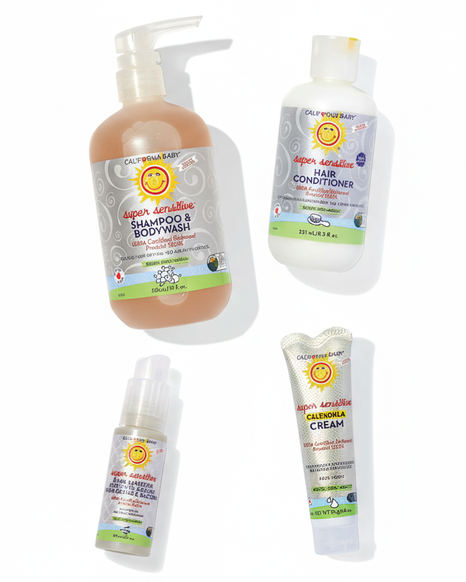 Set of California Baby products including shampoo, bodywash, hair conditioner, and cream on a white background