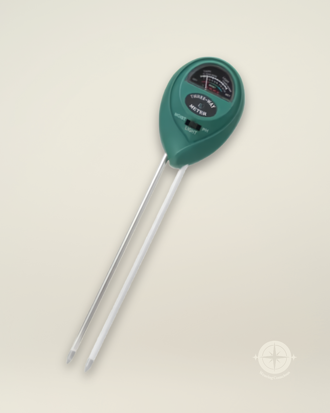 A green and white dual-probe meat thermometer with a dial gauge, shown on a light beige background.