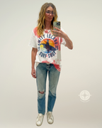 Person taking a selfie wearing the custom distressed Jaws Ride Amity Island Surf Shop Tee