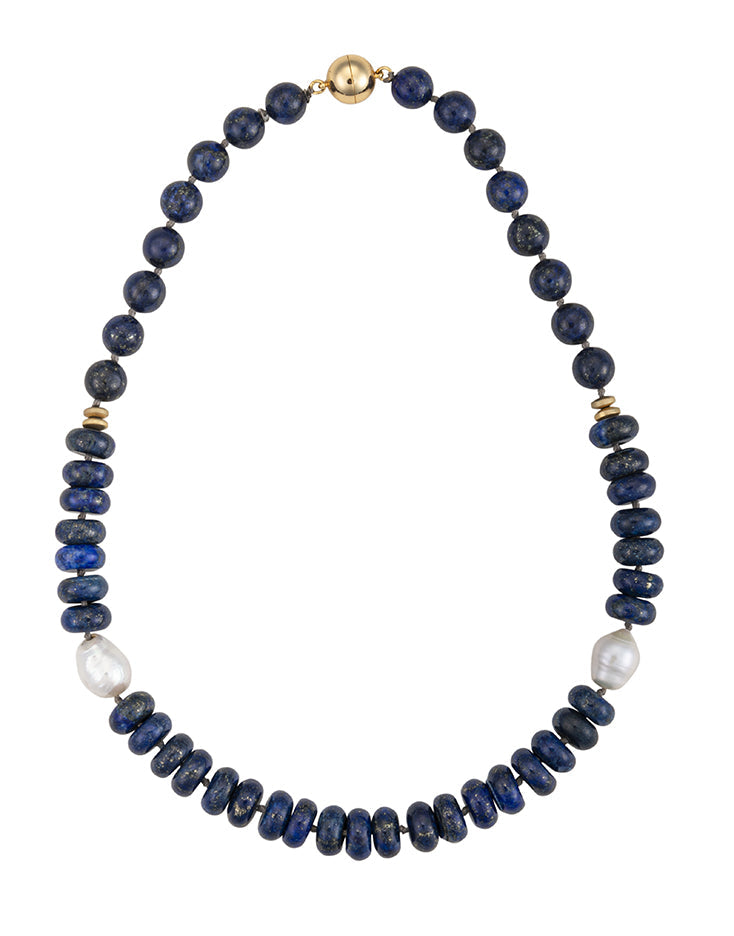 Necklace with blue beads and pearls on a white background