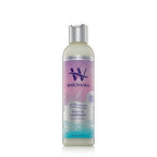 Bottle of Watch & Sea conditioner with purple label on a white background