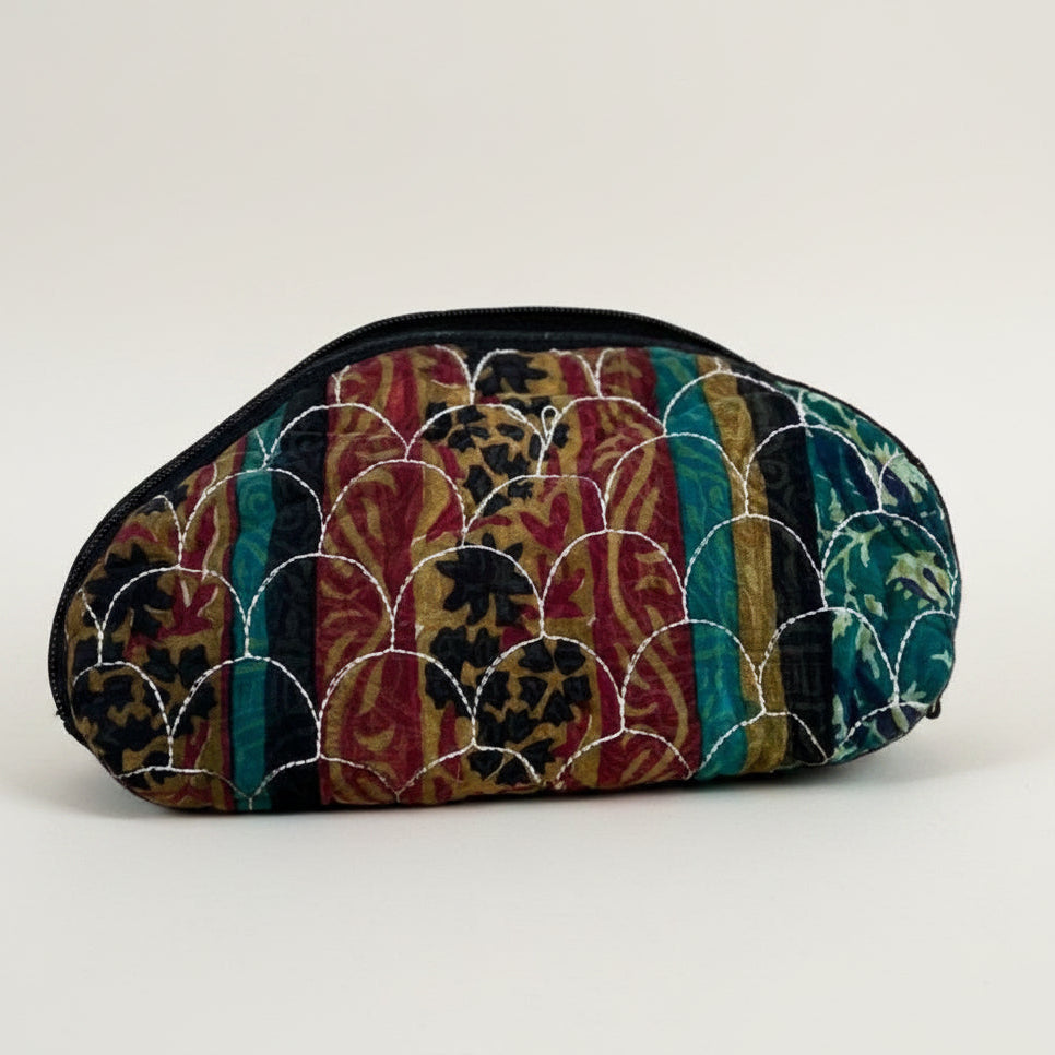 Colorful fabric-covered eyeglass case on a white background