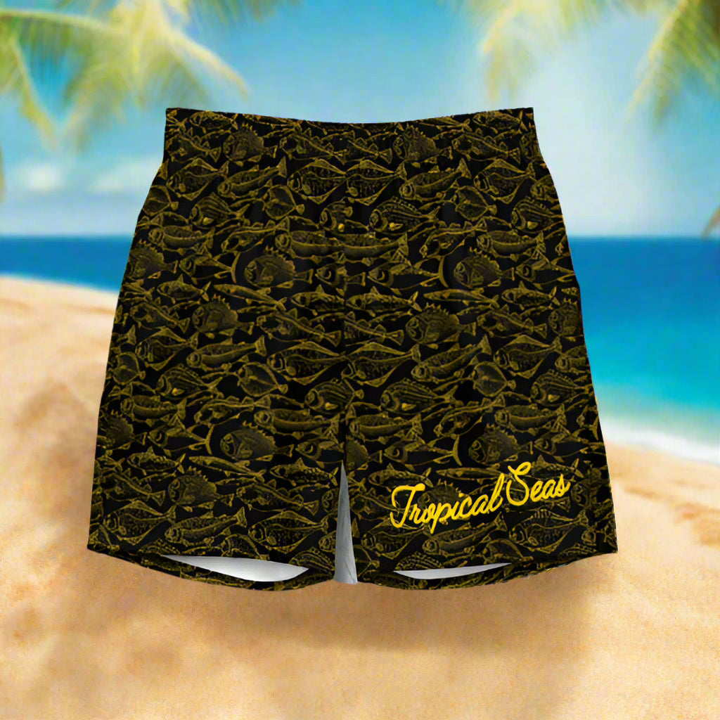 Black shorts with yellow pattern and 'Tropical Seas' branding on a wave background