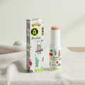 Stick of makeup with packaging featuring New York City-themed graphics on a white background