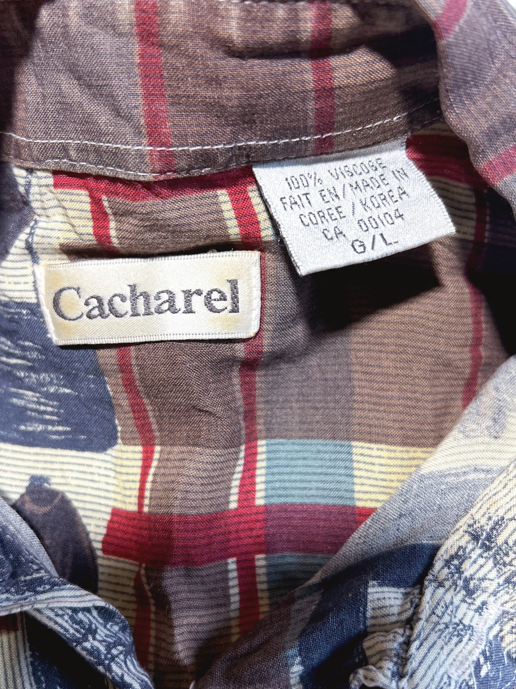 Close-up of a plaid shirt collar showing the Cacharel brand label and a sewn-in size label reading 100% viscose, Fait en/Made in Corée / Korea, 0/L.