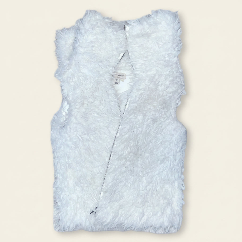 White fluffy vest on a white background