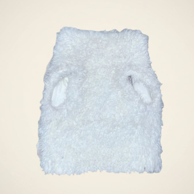 Fluffy white baby vest on a white background