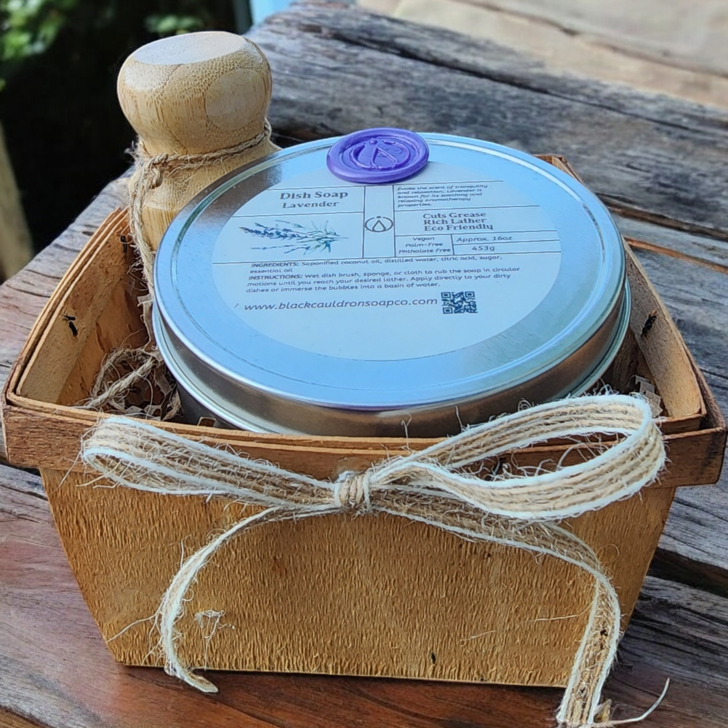 Jar with a wooden lid and label on a rustic wooden surface