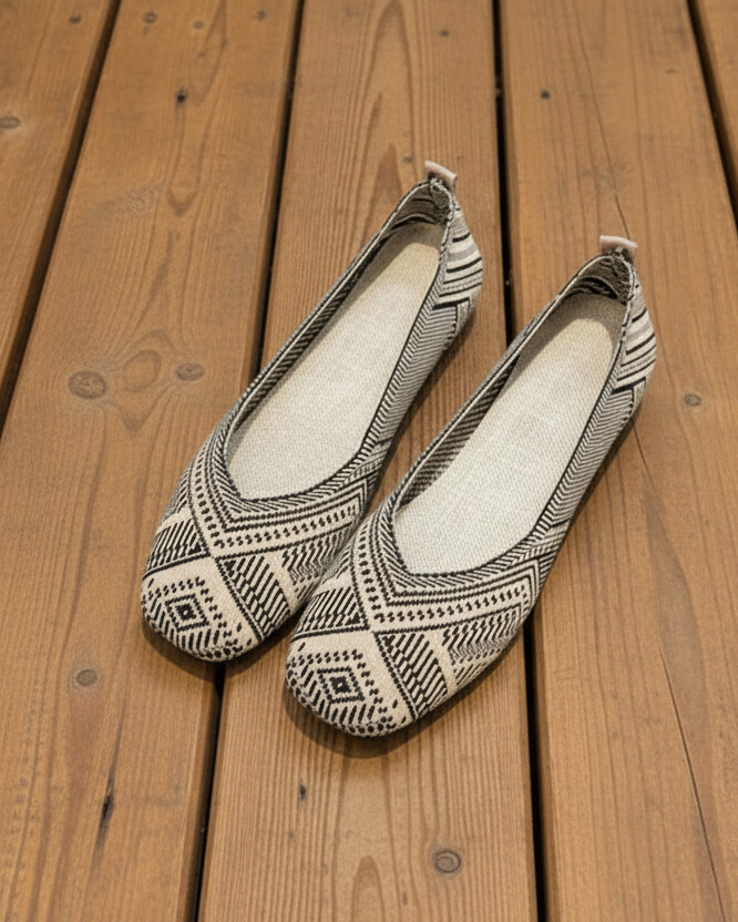 Pair of patterned flats on sunny porch