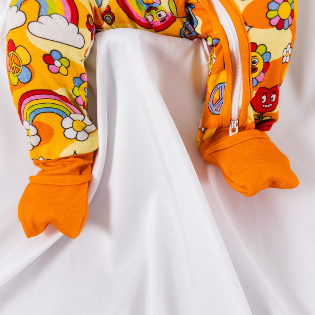 woman-owned eco-friendly USA baby brand footed pajamas with flower friends print