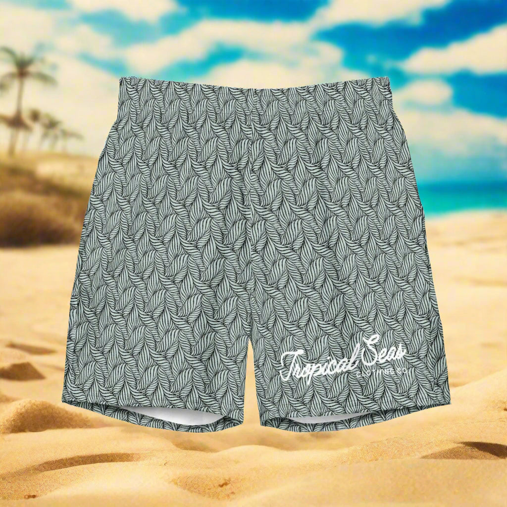 Gray shorts with leaf pattern and 'Tropical Seas' logo on a white background